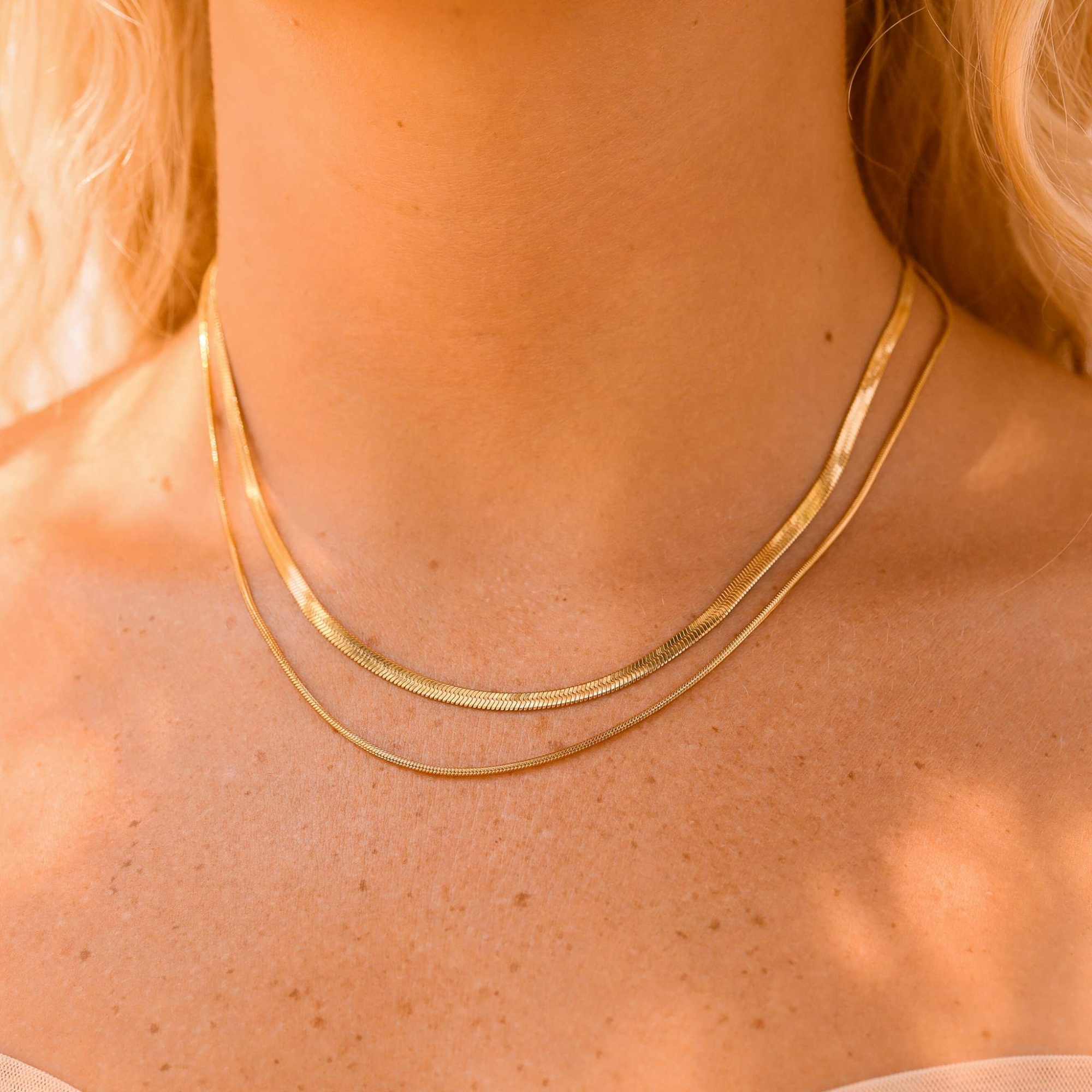 layered herringbone and snake necklace